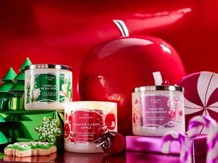 A candle in a holiday tin.