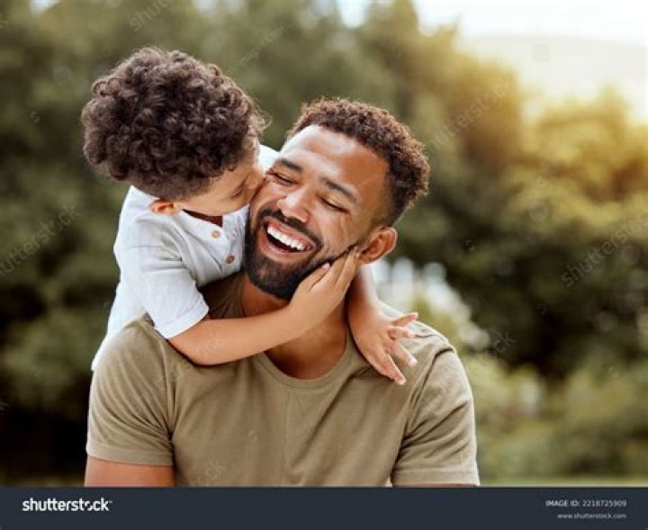 A father and son are having a conversation A father and son are having a conversation