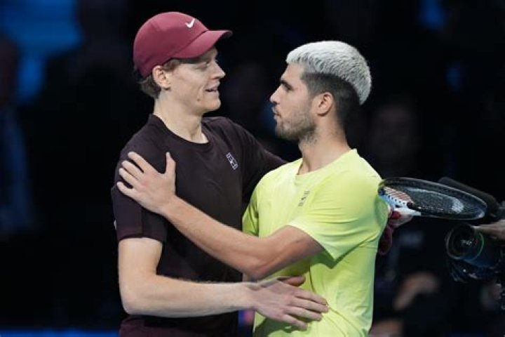 A hug between Carlos Alcaraz and Novak Djokovic