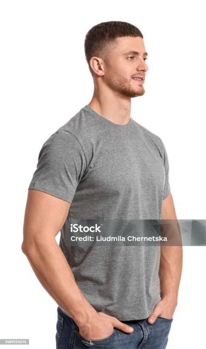 A man wearing a grey shirt is sad A man wearing a grey shirt is sad