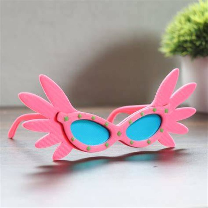 A model in pink sunglasses