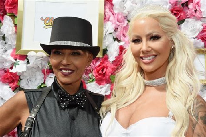 Amber Rose and her BFF Blac Chyna hand and hand at her meet and greet sunglass at Kitson on Melrose Featuring: Amber Rose Where: Los Angeles, California, United States When: 27 Aug 2015 Credit: 3rd Eye/WENN.COM