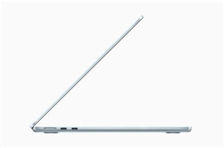 Apple MacBook Air M1 closed with iphone on top Apple MacBook Air M1 closed with iphone on top
