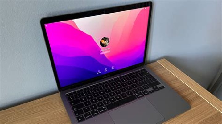 Apple MacBook Air M1 paint photo displayed on screen Apple MacBook Air M1 paint photo displayed on screen