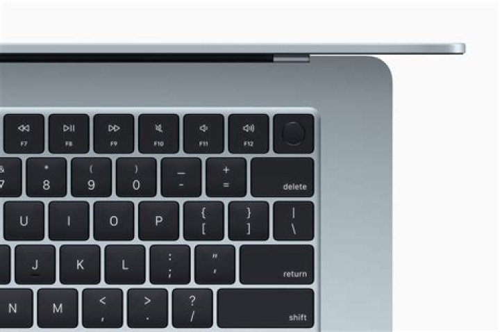 Apple MacBook Air M1 showing photos of fruits Apple MacBook Air M1 showing photos of fruits
