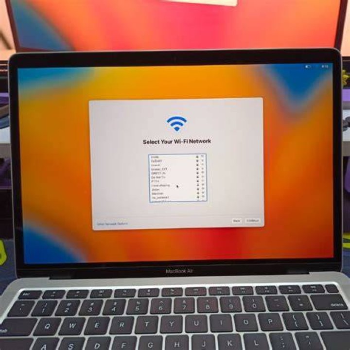 go to folder window go to library macbook wifi shows exclamation mark