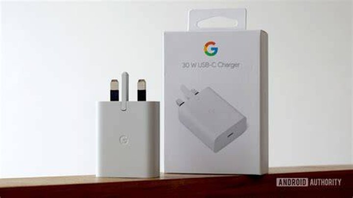 Google 30W USB C Power Charger resting on Google Pixel 6 and 6 Pro