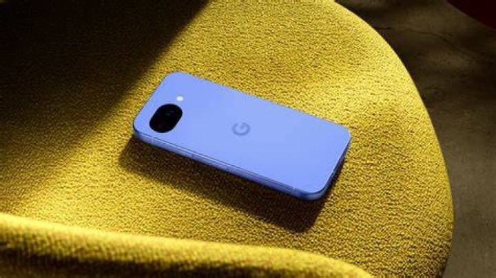 Google Pixel 5 using phone from the back 2 Google Pixel 5 using phone from the back 2