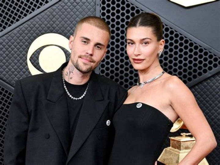 Hailey Bieber and Justin Bieber holding hands