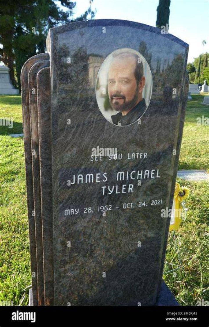 James Michael Tyler looking at camera