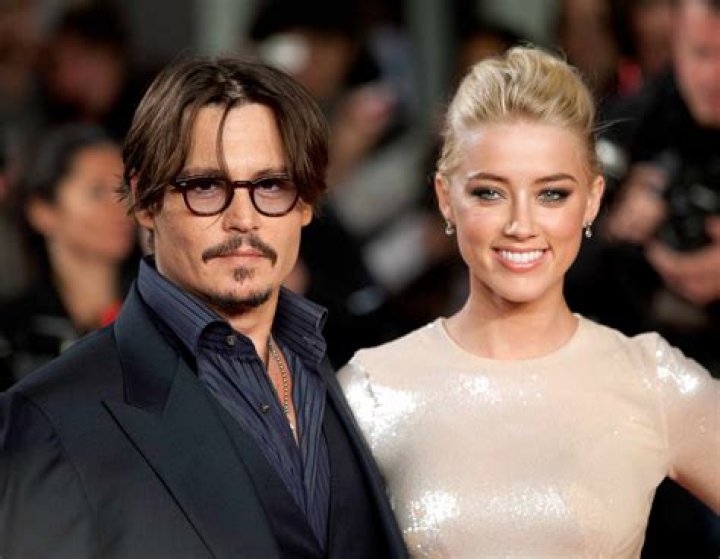 Johnny Depp and Amber Heard attend The UK Premiere of 'The Rum Diary' at at Odean, Kensington on November 3, 2011 in London, England.