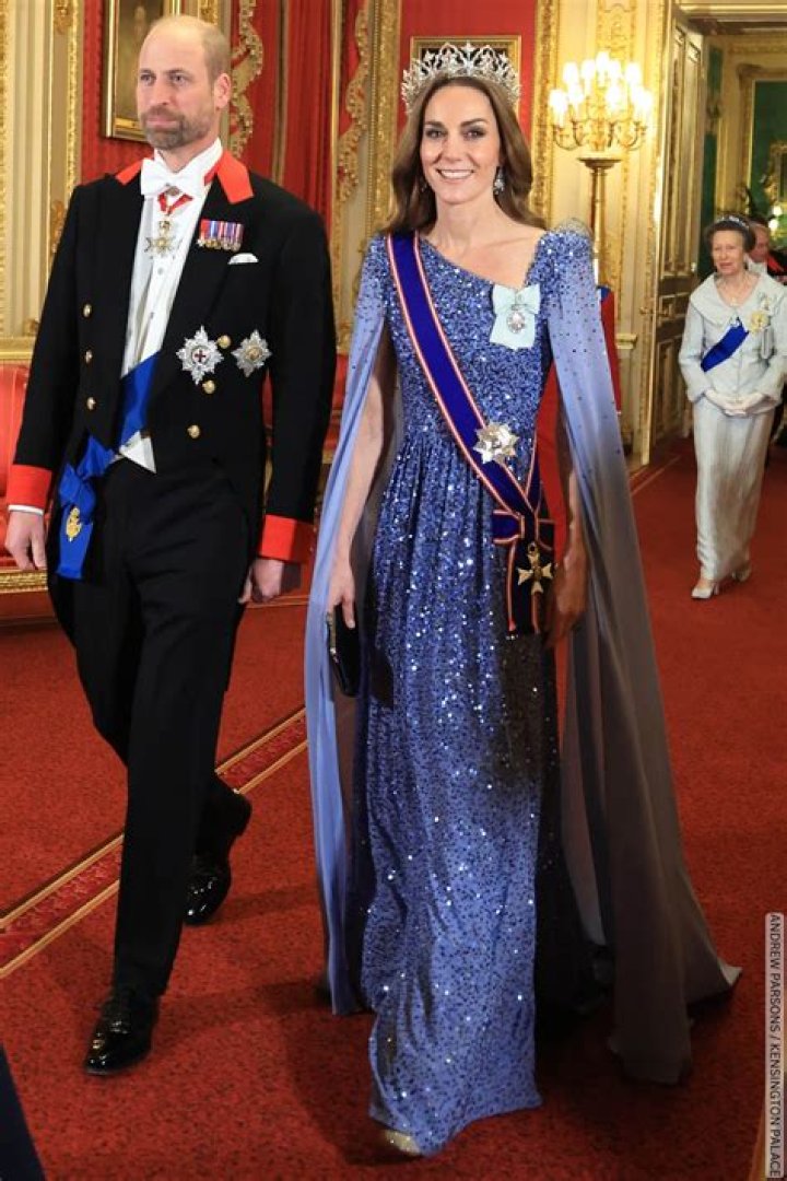 Kate Middleton with an elegant chignon and hat