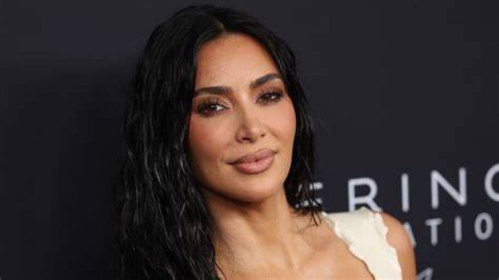 Kim Kardashian in a see-through wet bikini