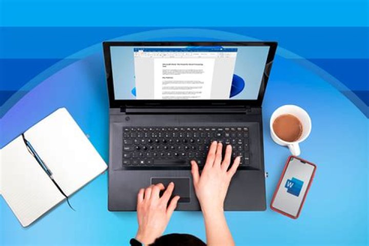 user working on laptop laptop on desk with user - Windows server how to block ip; block ip range