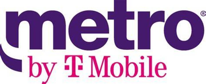 Metro by T Mobile logo on phone stock photo 1 Metro by T Mobile logo on phone stock photo 1
