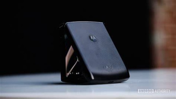 Moto Razr foldable half folded in hand Moto Razr foldable half folded in hand
