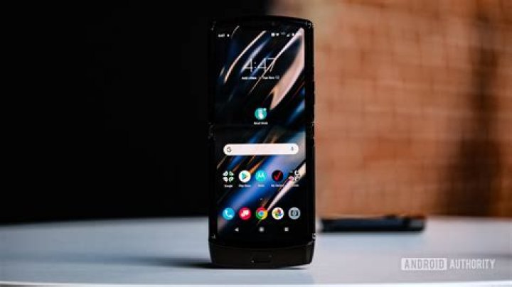 Moto Razr foldable unfolded upright on table Moto Razr foldable unfolded upright on table