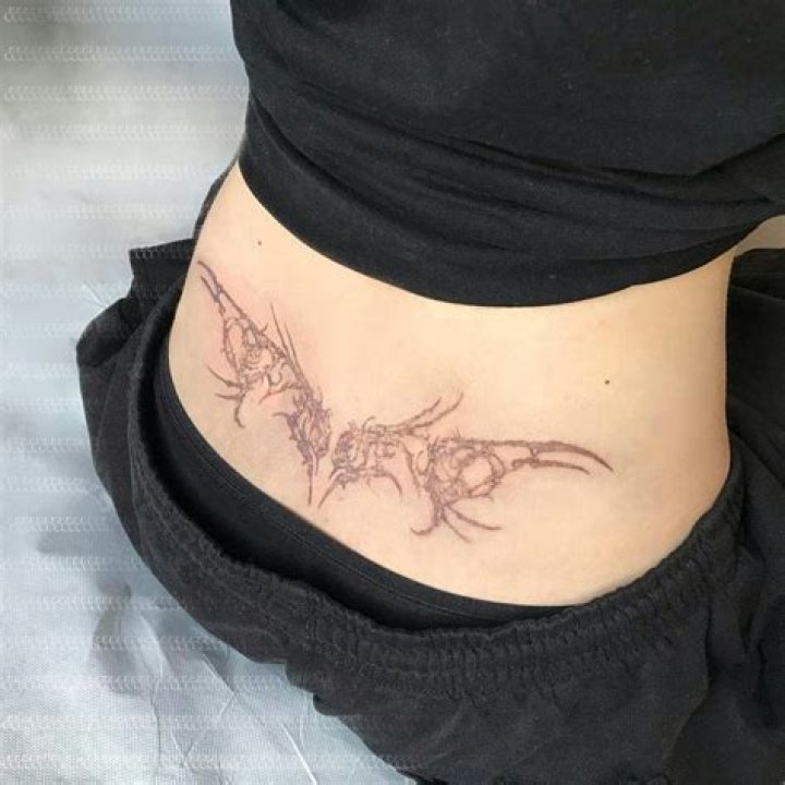 Pattern Lower Back Tattoo