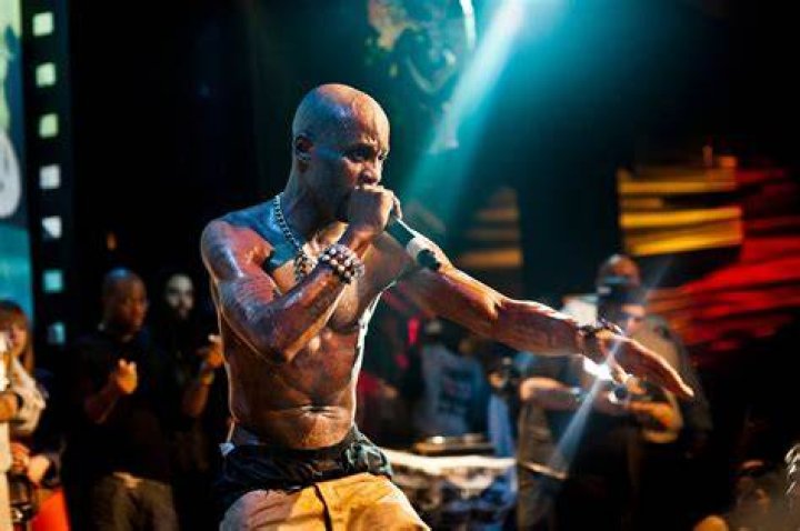 Rapper DMX performing in green
