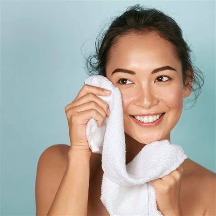 Removing Makeup with Towel Adobe