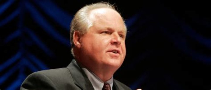 Rush Limbaugh speaks at a radio broadcasters' convention in 2003.