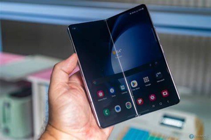 Samsung Galaxy Fold half folded on table Samsung Galaxy Fold half folded on table