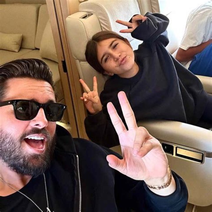 Scott Disick, Sofia Richie posing