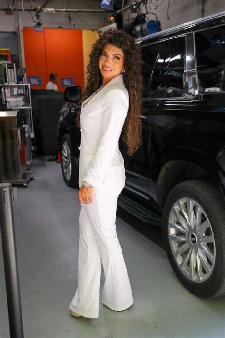 Teresa Giudice posing for a photo for a night out