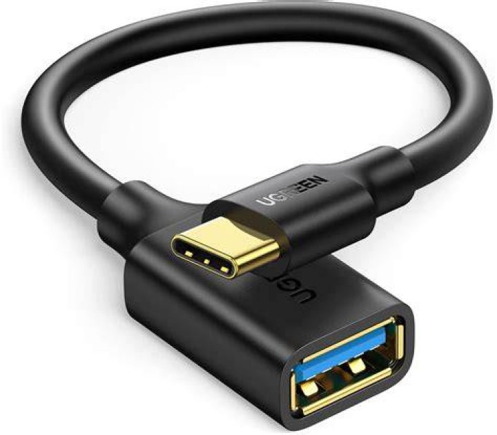 The blue-cable adapter connecting a mobile phone to a Game Boy Color