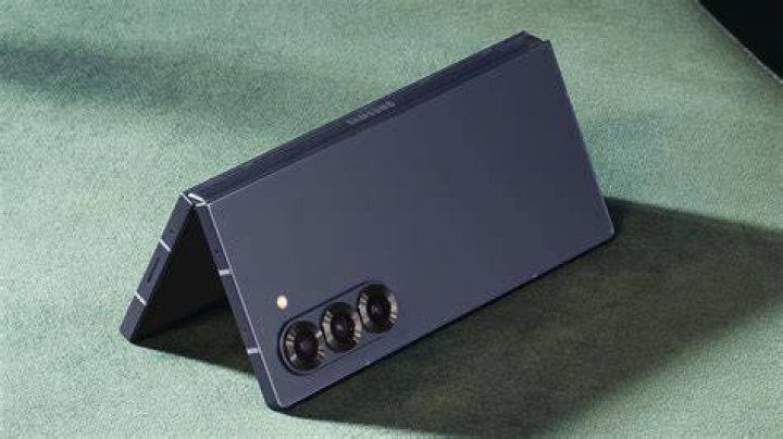 The Galaxy Z Fold 3 standing upright.