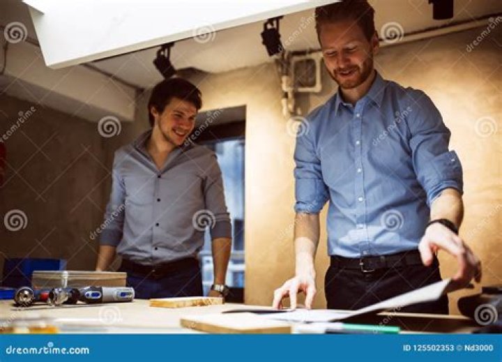 Two creative designers in an office