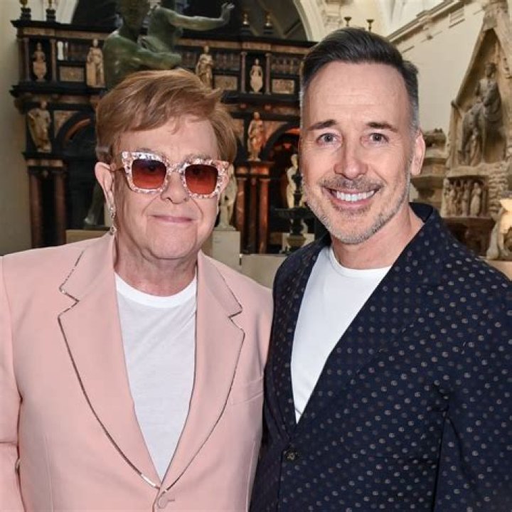 Why does John adopt Jamie?