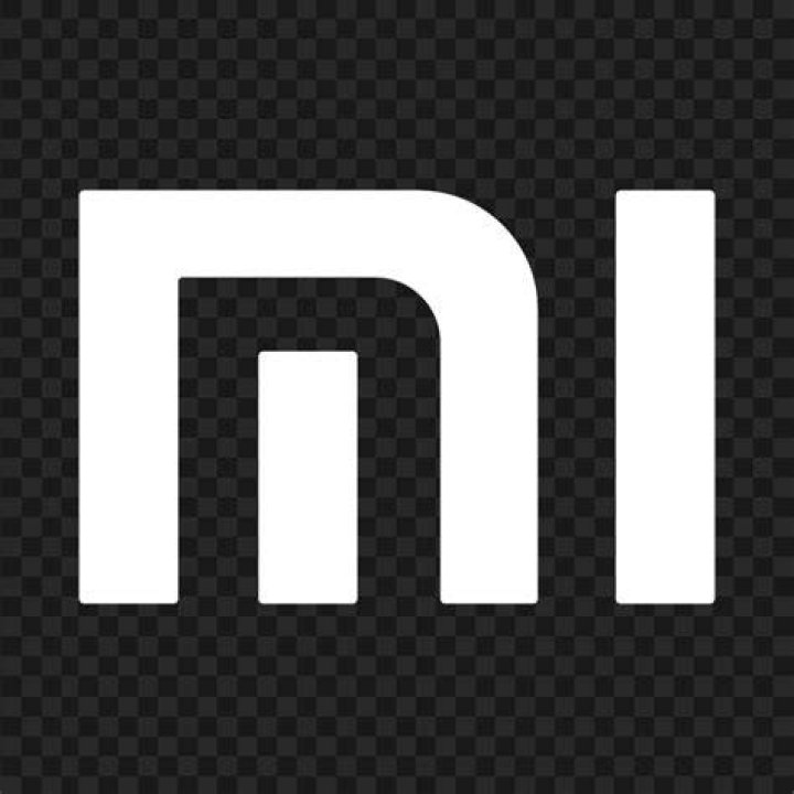 Xiaomi Mi logo on white wall Xiaomi Mi logo on white wall